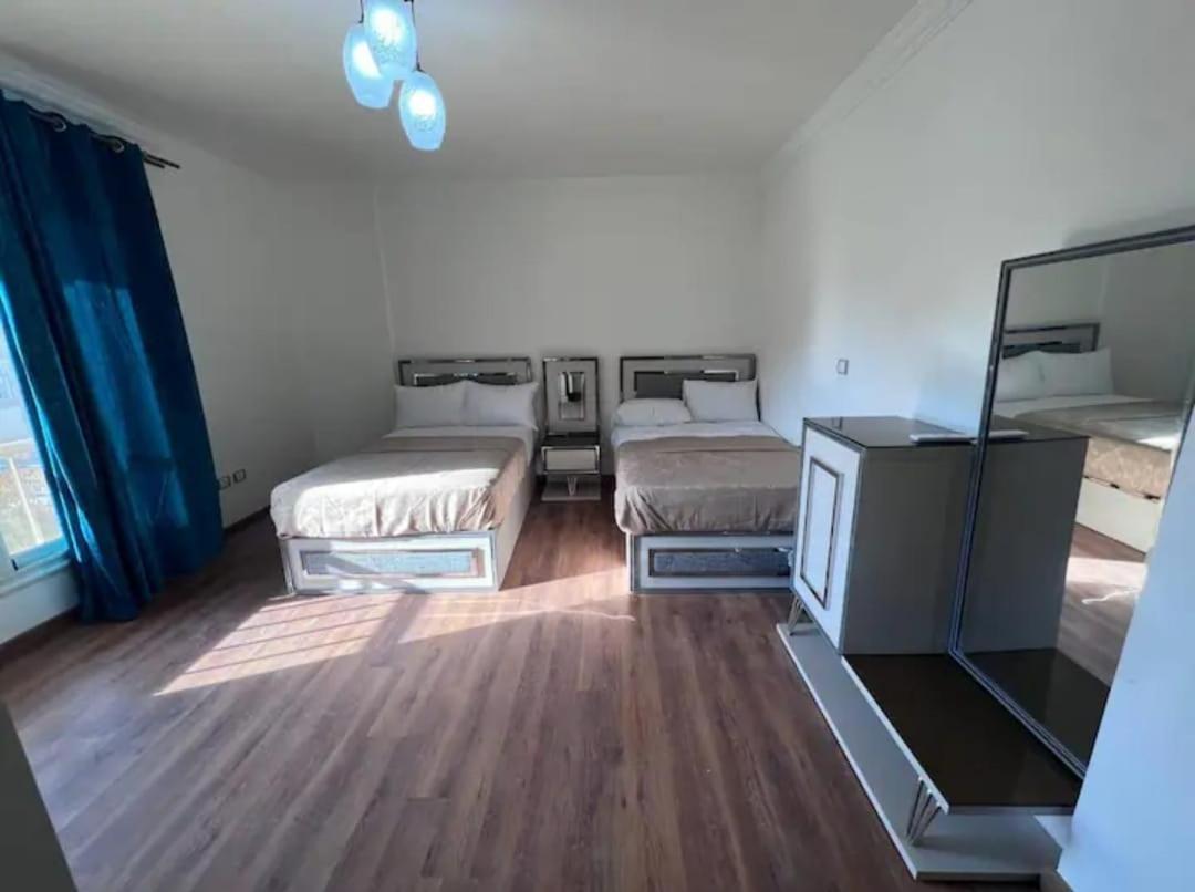 Jayd Garden Retreat: Elegant Two-bedroom Near Al-rehab * Cairo