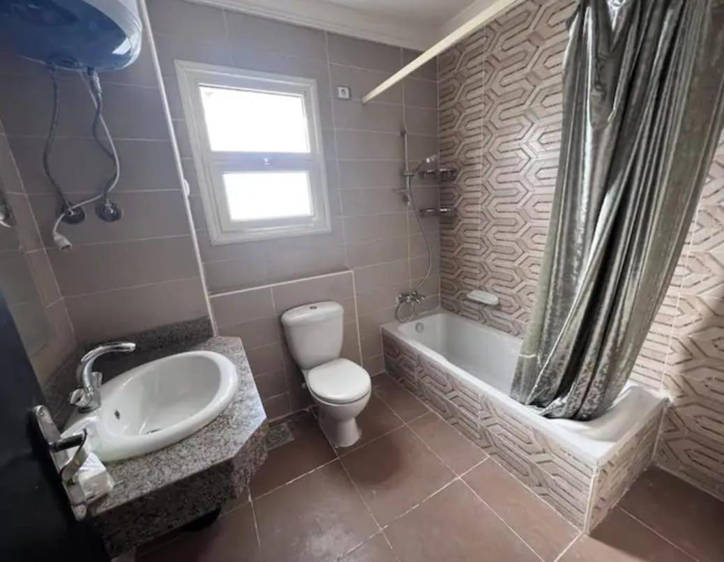 Jayd Garden Retreat: Elegant Two-bedroom Near Al-rehab * Cairo